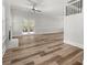 Bright, open living room featuring hardwood floors, a fireplace, and French doors to the yard at 3705 Paces Park Se Cir, Smyrna, GA 30080