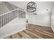 Stylish living area with hardwood floors, stairs and contemporary lighting fixtures at 3705 Paces Park Se Cir, Smyrna, GA 30080