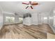 Spacious living room with hardwood floors, ceiling fans, and plenty of natural light at 3705 Paces Park Se Cir, Smyrna, GA 30080