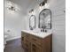 Bathroom featuring double vanities with framed mirrors at 41 Olde Town Way, Rockmart, GA 30153