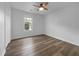 Bedroom with fan, hardwood floors and natural lighting at 41 Olde Town Way, Rockmart, GA 30153