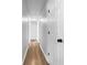 Hallway with hardwood flooring and white trim at 41 Olde Town Way, Rockmart, GA 30153