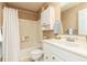 Full bathroom with a tub-shower, vanity with a sink and a mirror at 4424 Robinson St, Acworth, GA 30101