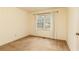 Bedroom featuring a large window, neutral walls, and carpeted flooring at 4424 Robinson St, Acworth, GA 30101