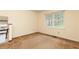 Bright bedroom featuring neutral carpet, cream walls, large window providing lots of natural light at 4424 Robinson St, Acworth, GA 30101