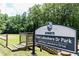 Acworth East Lakeshore Dr Park entrance sign with a view of the surrounding trees and greenery at 4424 Robinson St, Acworth, GA 30101