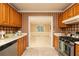 Functional kitchen layout showcasing stainless steel appliances and a clear view to the dining area at 4424 Robinson St, Acworth, GA 30101