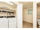 Bright Laundry Room with utility sink and washer/dryer at 4424 Robinson St, Acworth, GA 30101