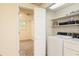 Bright Laundry Room with utility sink and washer/dryer at 4424 Robinson St, Acworth, GA 30101