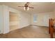 Comfortable living area with a ceiling fan, classic trim, and doorway to the adjacent dining room at 4424 Robinson St, Acworth, GA 30101