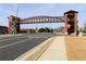 Street view with a pedestrian bridge displaying 'Acworth' and surrounding buildings and crosswalks at 4424 Robinson St, Acworth, GA 30101