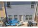 A cozy backyard with blue patio furniture set creates an inviting outdoor living space, perfect for relaxation at 265 Valley Xing, Canton, GA 30114