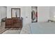 Comfortable bedroom featuring a dresser with a mirror and a walk-in closet at 265 Valley Xing, Canton, GA 30114