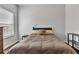 Bedroom with natural light features a bed with pillows, dresser and window at 265 Valley Xing, Canton, GA 30114