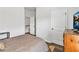 Bedroom with natural light features a bed with pillows, dresser and TV at 265 Valley Xing, Canton, GA 30114