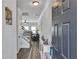 Inviting entryway featuring hardwood floors, neutral paint, and views into living area at 265 Valley Xing, Canton, GA 30114