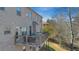 Back deck with room for outdoor entertaining overlooking the backyard of this brick home at 3206 Letha Woods Dr, Conyers, GA 30094
