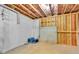 Unfinished basement with framed walls and exposed ceiling, ready for customization and ample storage at 3206 Letha Woods Dr, Conyers, GA 30094
