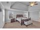A generously-sized main bedroom has neutral paint, carpet, and a bench at 3206 Letha Woods Dr, Conyers, GA 30094