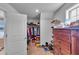 Walk-in closet includes custom organization and a window for natural light at 3206 Letha Woods Dr, Conyers, GA 30094