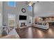 Spacious living room featuring a fireplace, high ceilings, and an open floor plan, ideal for Gathering gatherings at 3206 Letha Woods Dr, Conyers, GA 30094