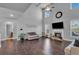 Bright living room with fireplace and large windows, offering ample natural light at 3206 Letha Woods Dr, Conyers, GA 30094