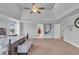Large main bedroom with vaulted ceiling, carpet, and lots of windows at 3206 Letha Woods Dr, Conyers, GA 30094