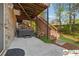 Backyard deck includes a hot tub area and stairs leading to other parts of the yard at 420 Eagle Tiff Dr, Sugar Hill, GA 30518