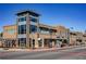 Commercial building featuring upscale architectural design and pedestrian-friendly sidewalks at 420 Eagle Tiff Dr, Sugar Hill, GA 30518