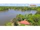 Stunning aerial view of a lakeside property featuring lush greenery and peaceful water views at 50 Silver Lake Dr, Mansfield, GA 30055