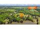 Aerial view of community launch, lake, and surrounding area showcasing the neighborhood at 50 Silver Lake Dr, Mansfield, GA 30055