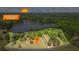 Aerial view of a large property highlighting lake access and sunset views at 50 Silver Lake Dr, Mansfield, GA 30055