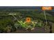 Aerial view of property showing storage shed, lake access, and a no through traffic location at 50 Silver Lake Dr, Mansfield, GA 30055