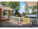 Lush backyard with a view of the lake and access to the house at 50 Silver Lake Dr, Mansfield, GA 30055