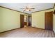 Light-filled bedroom features hardwood floors and offers easy access to an ensuite bathroom and closet at 50 Silver Lake Dr, Mansfield, GA 30055