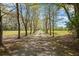 Long private driveway leads to a beautiful wooded lot with lots of privacy and seclusion at 50 Silver Lake Dr, Mansfield, GA 30055