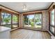 Bright room with large windows offering picturesque views of the lake and landscaped yard at 50 Silver Lake Dr, Mansfield, GA 30055