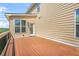 Spacious back deck with wood flooring perfect for outdoor enjoyment and entertaining at 5895 Springbox Dr, Suwanee, GA 30024