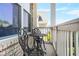 Charming balcony with iron table and chairs, offering a cozy outdoor retreat at 5895 Springbox Dr, Suwanee, GA 30024