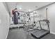 Home gym features ample equipment and plenty of space at 5895 Springbox Dr, Suwanee, GA 30024
