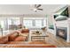 Bright living room with a fireplace and an open floor plan at 5895 Springbox Dr, Suwanee, GA 30024