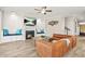 Cozy living room featuring a fireplace, built-ins, and comfortable seating at 5895 Springbox Dr, Suwanee, GA 30024