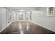 Mirrored wall accents a unique finished basement space with a window at 175 Oak Manor, Fayetteville, GA 30214