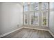 Bright Living room featuring high ceilings and an abundance of windows at 175 Oak Manor, Fayetteville, GA 30214