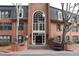 Attractive brick building with a grand entrance, a large arched window, and manicured landscaping at 24317 Plantation Ne Dr, Atlanta, GA 30324