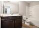 Bathroom featuring a vanity, toilet, and bathtub-shower combo at 2721 Kemp Sw Ct, Conyers, GA 30094