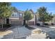 Charming townhouse featuring a two-car garage, brick accents, and mature trees at 2721 Kemp Sw Ct, Conyers, GA 30094