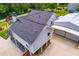 Aerial view of a beautiful home with an expansive driveway and well-maintained landscaping at 84 Ledbetter Rd, Villa Rica, GA 30180