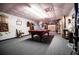Basement with carpet, pool table, bar, and garage access at 84 Ledbetter Rd, Villa Rica, GA 30180