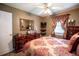 Bedroom with carpet, a ceiling fan, natural light, and furniture at 84 Ledbetter Rd, Villa Rica, GA 30180